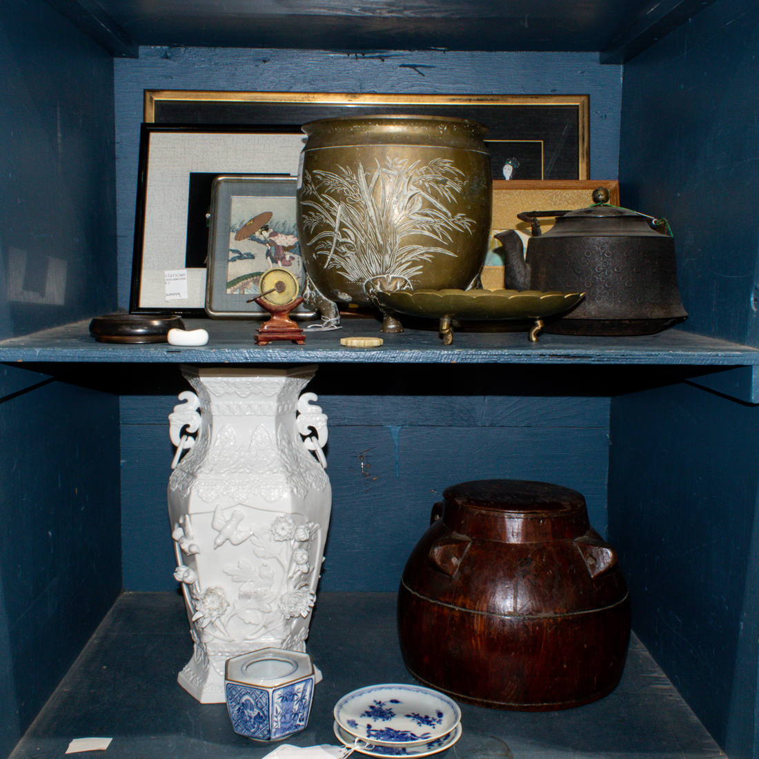 TWO SHELVES OF MAINLY ASIAN DECORATIVE