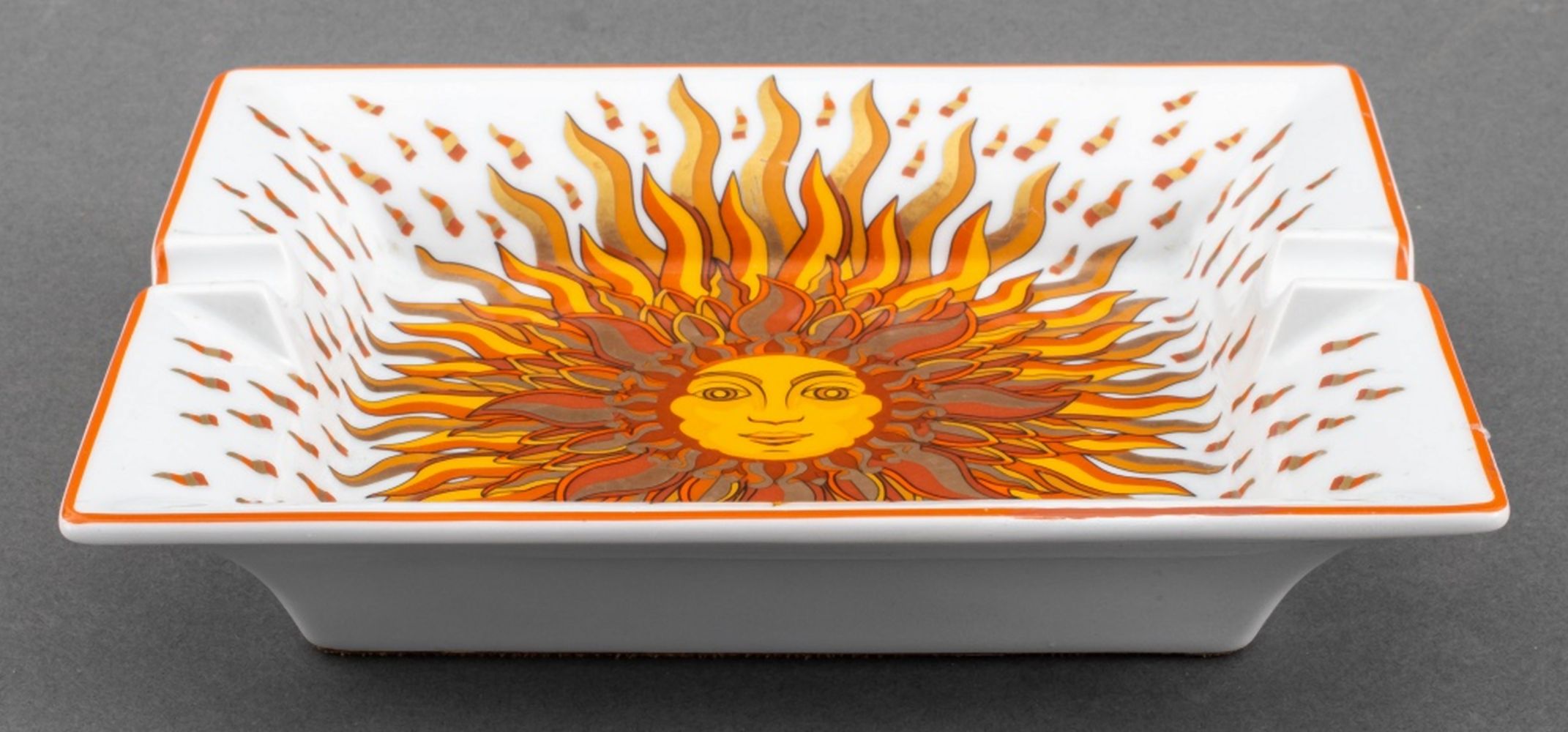 HERMES ORANGE SUN MOTIF PORCELAIN ASHTRAY