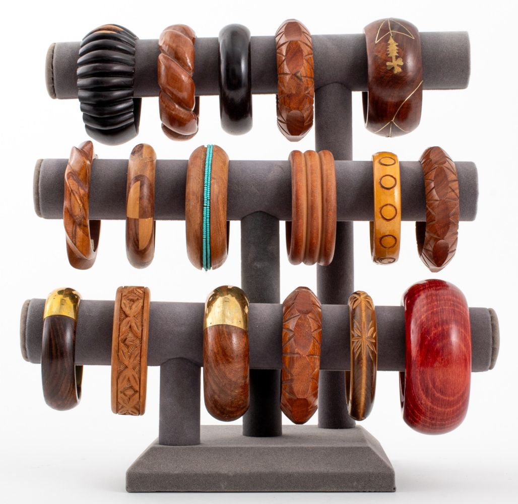 COLLECTION OF WOODEN BANGLES, 17