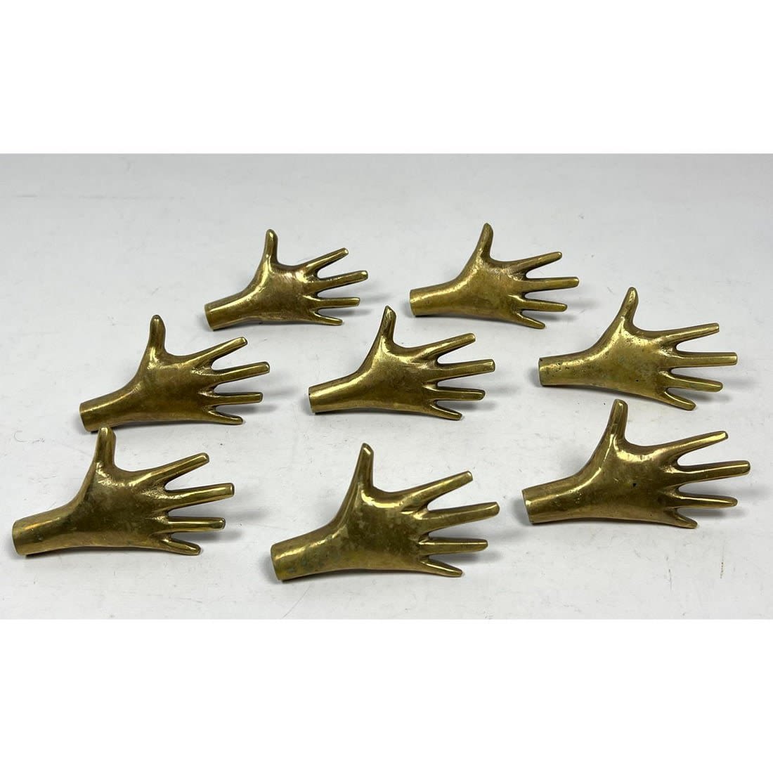 Set 8 brass HAND handles. Furniture