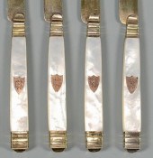 10 FRENCH SILVER-GILT KNIVES E