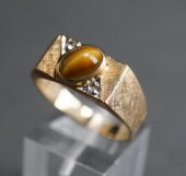 10-KARAT YELLOW-GOLD AND TIGER