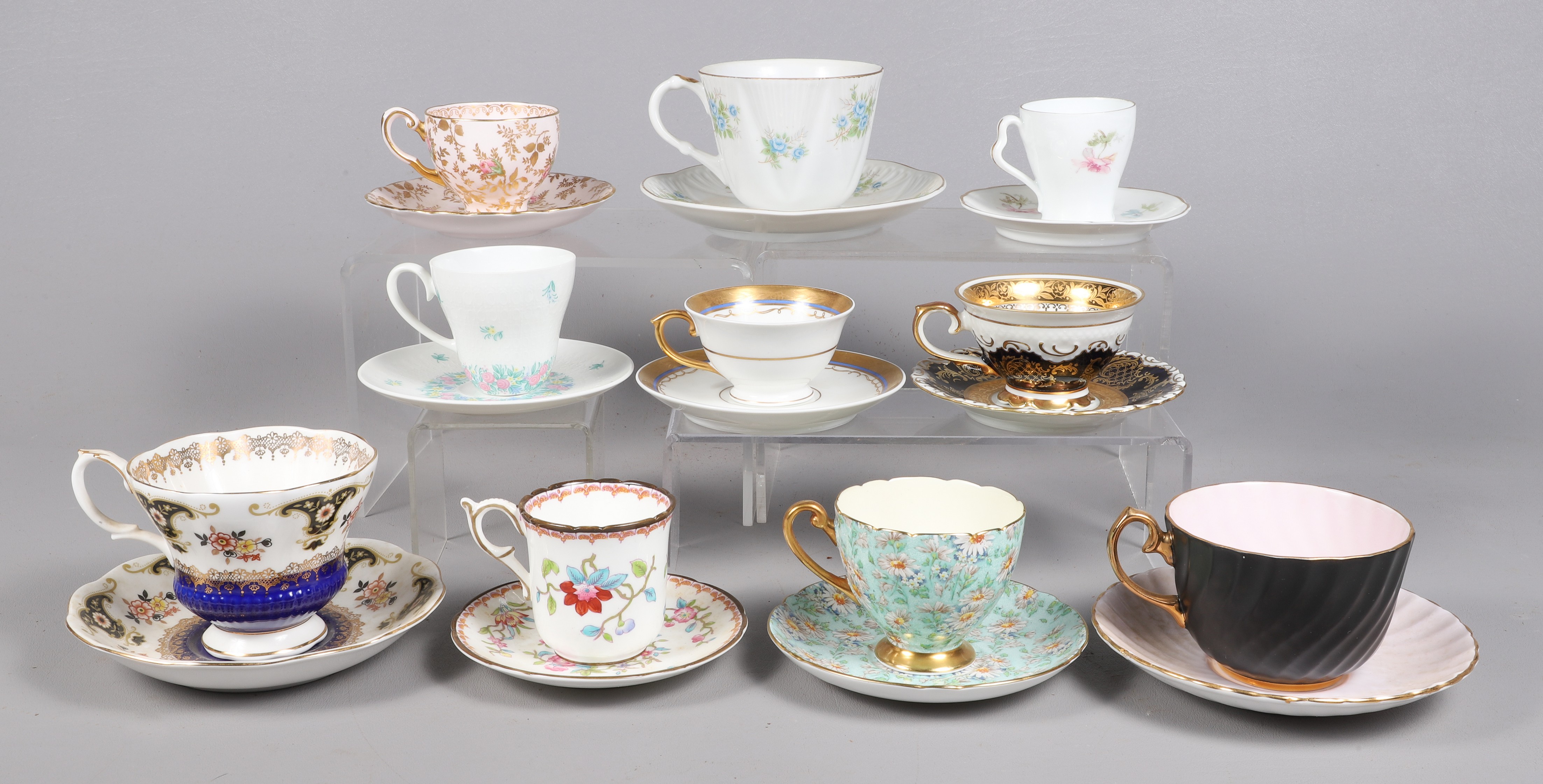 (10) Porcelain cup & saucer sets,