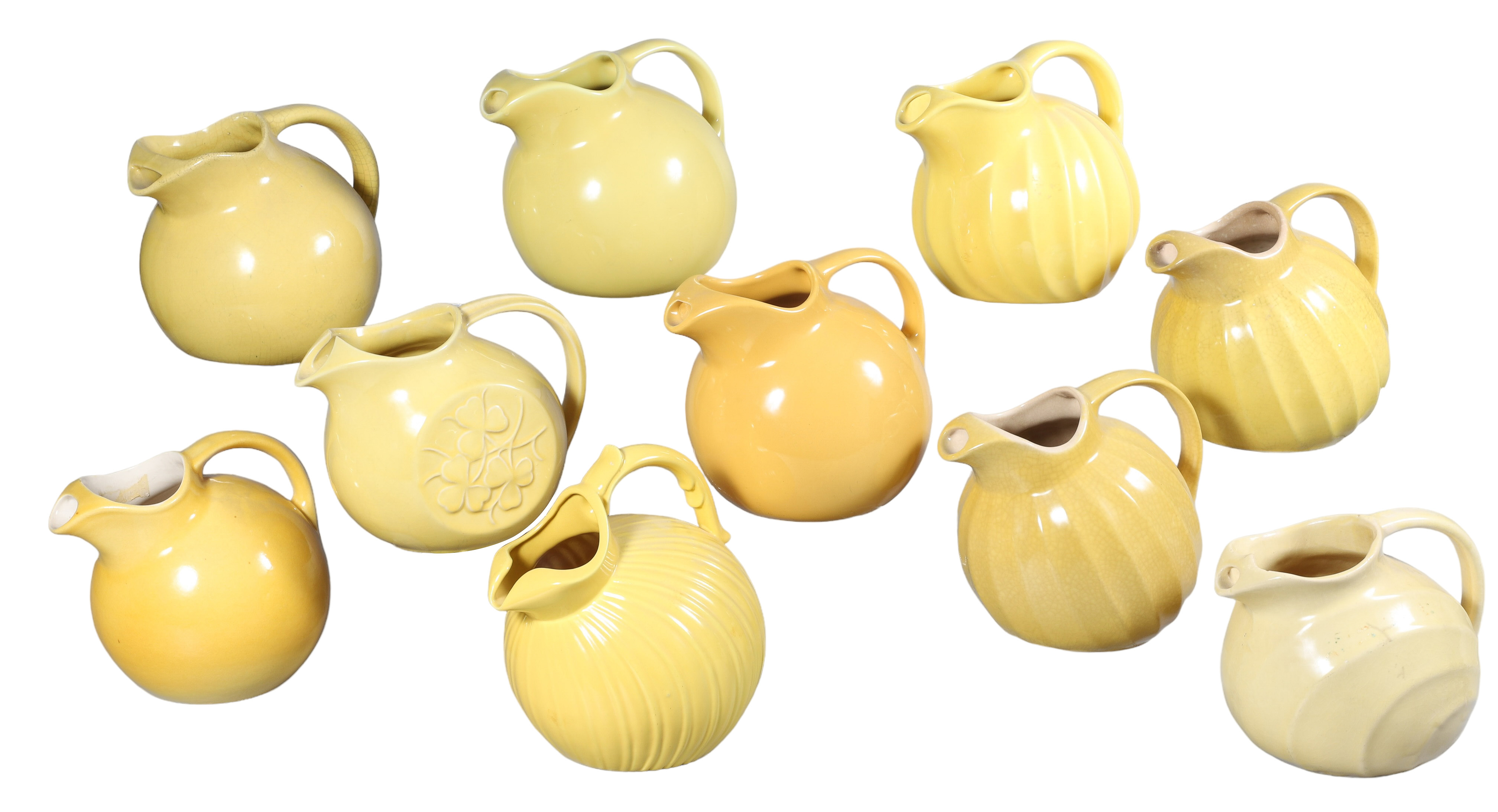(10) Yellow pottery ball pitchers