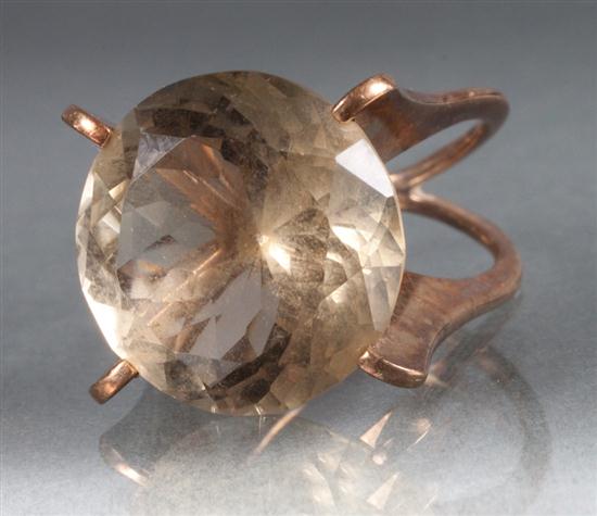 10K gold and pale yellow gemstone