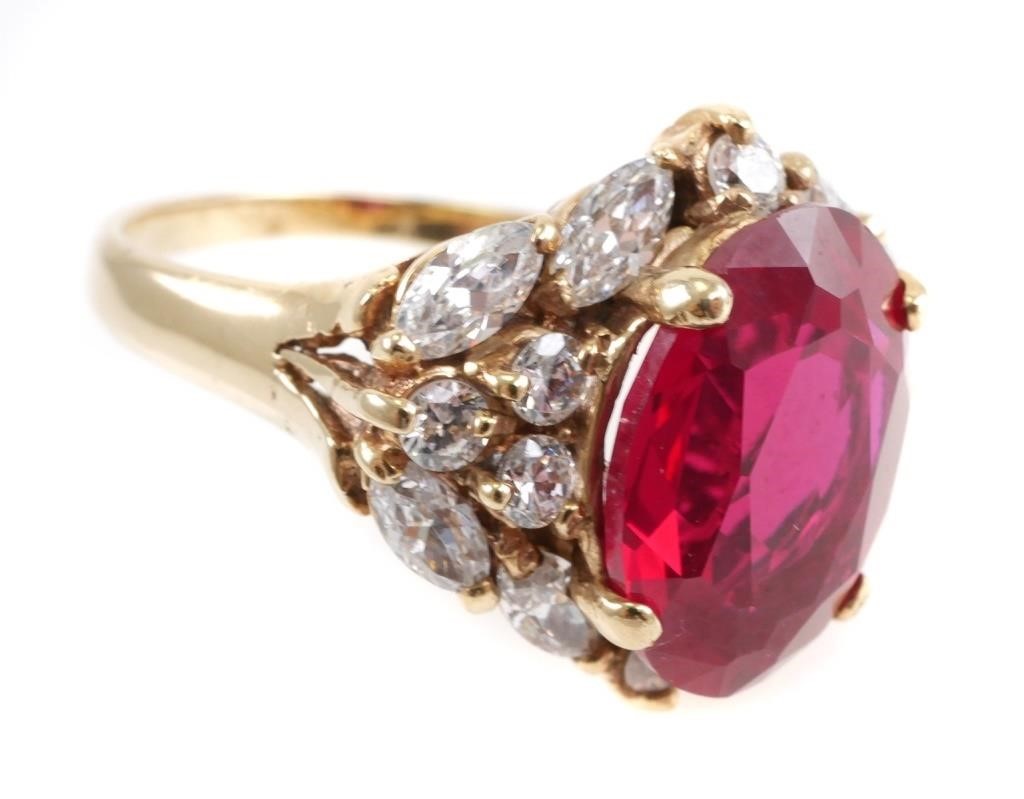 10K GOLD RING WITH RED STONE