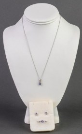 10K WHITE GOLD AND PURPLE STON