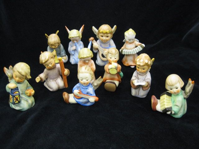 11 Hummel Figurines mostly