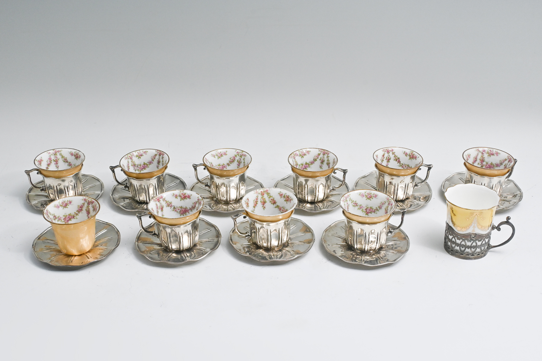 11 PC. STERLING CUP HOLDERS WITH