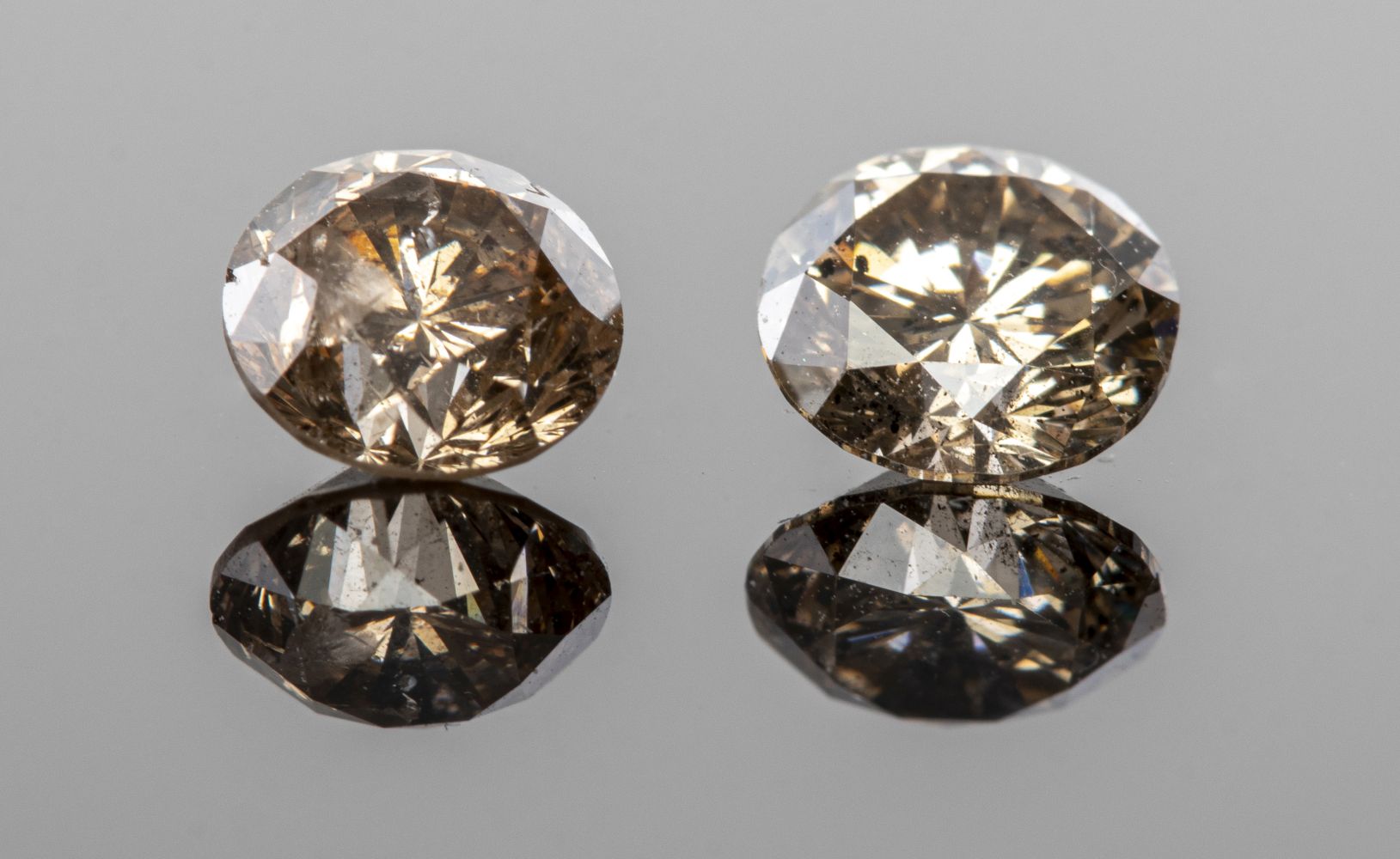 1.10 CTTW. PAIR OF  LOOSE ROUND