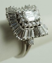 1.11CT EMERALD CUT DIAMOND AND