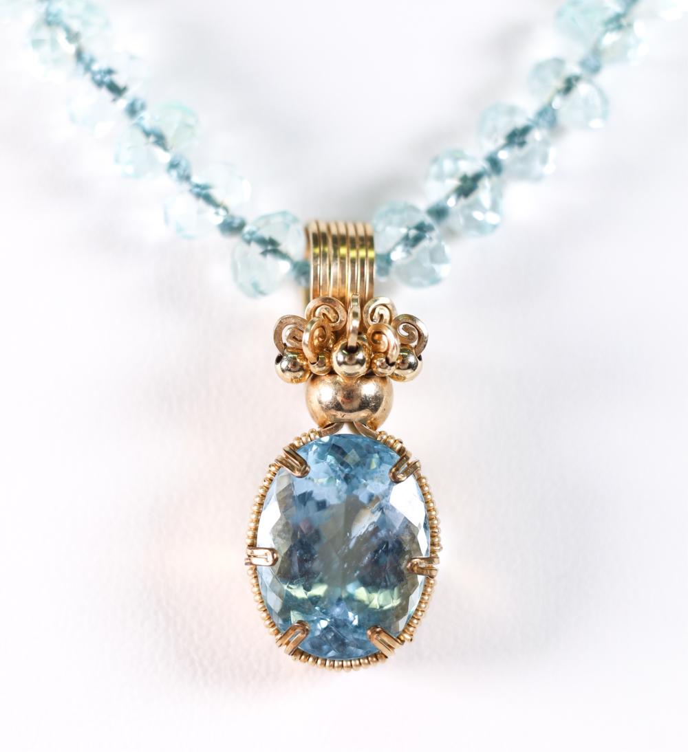 11.8CT AQUAMARINE PENDANT KNOTTED