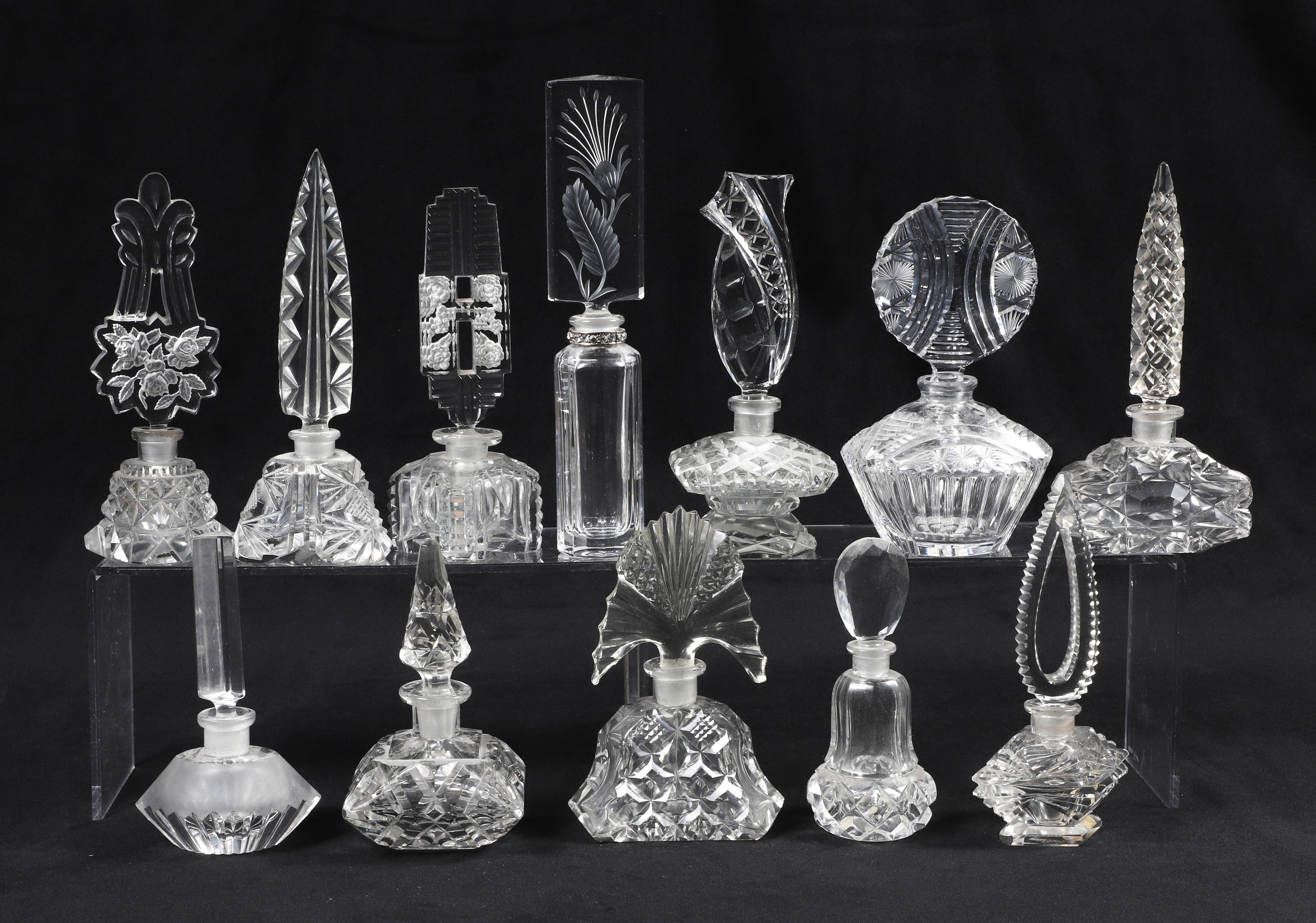 (12) Crystal scent bottles, in