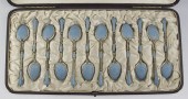 12 ENAMELED SPOONS MADE FOR TI