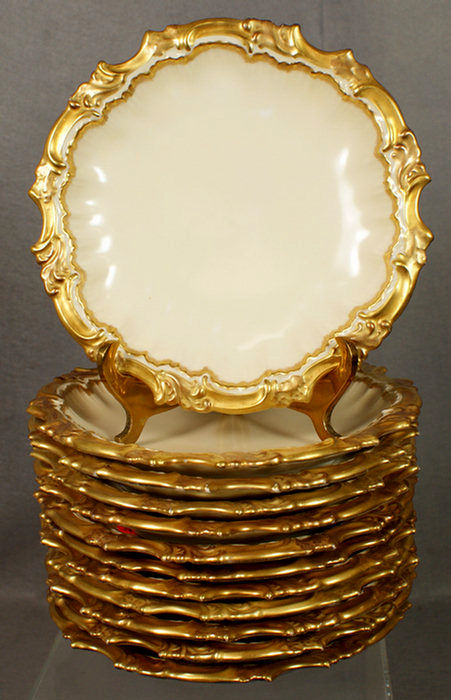 12 porcelain gilt border soup