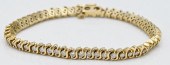14 KARAT GOLD AND DIAMOND INLI