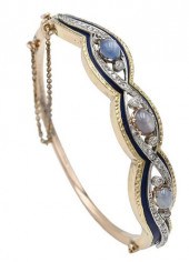 14 KARAT GOLD BANGLE BRACELET,