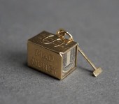 14-KARAT GOLD MAD MONEY CHARM,