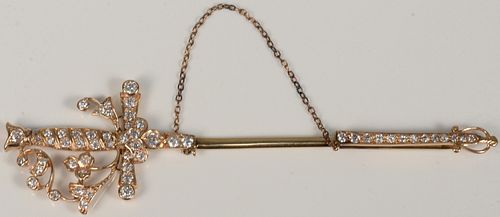 14 KARAT GOLD SWORD PIN SET WITH