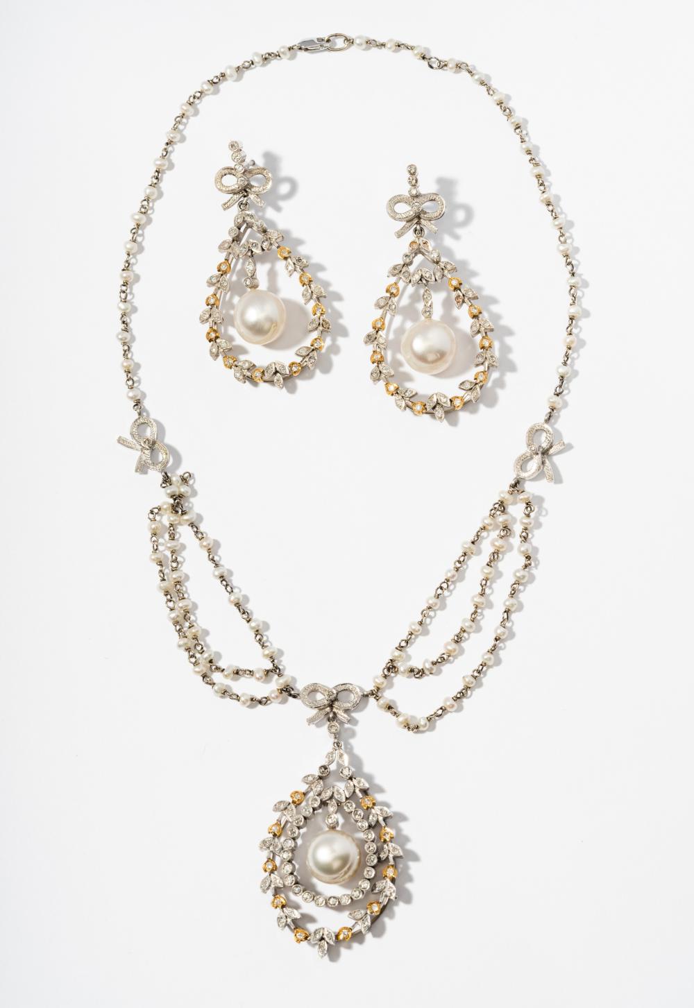 14 KARAT WHITE AND YELLOW GOLD,