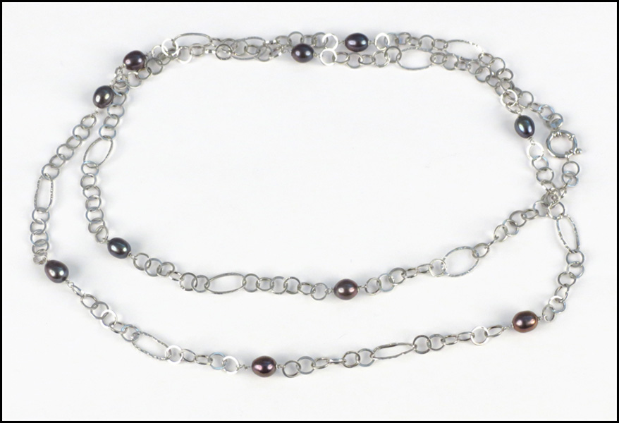 14 KARAT WHITE GOLD AND BLACK PEARL