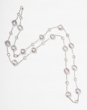 14 KARAT WHITE GOLD AND AMETHY