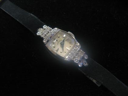 14 karat white gold and petite