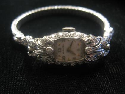 14 karat white gold and petite
