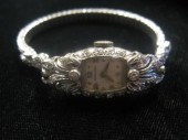 14 karat white gold and petite