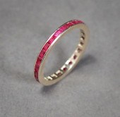 14-KARAT WHITE-GOLD AND RUBY E