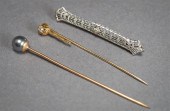 14-KARAT WHITE-GOLD BAR PIN, A