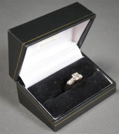 14-KARAT WHITE-GOLD SOLITAIRE