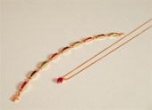 14 KARAT YELLOW GOLD AND RUBY