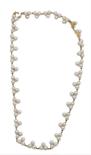 14 KARAT YELLOW GOLD AND PEARL