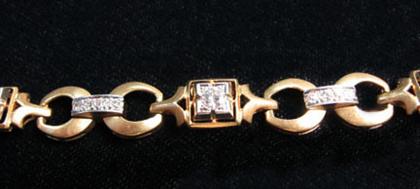14 karat yellow gold and diamond