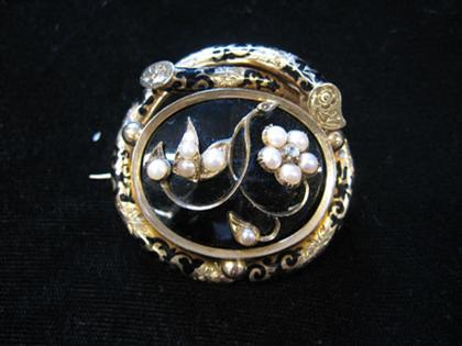 14 karat yellow gold and black