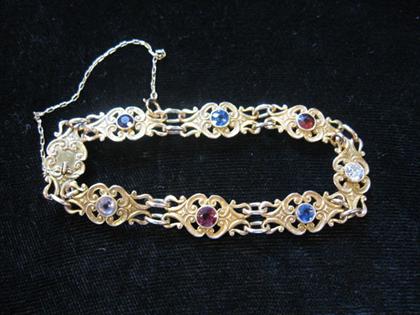 14 karat yellow gold and gem set