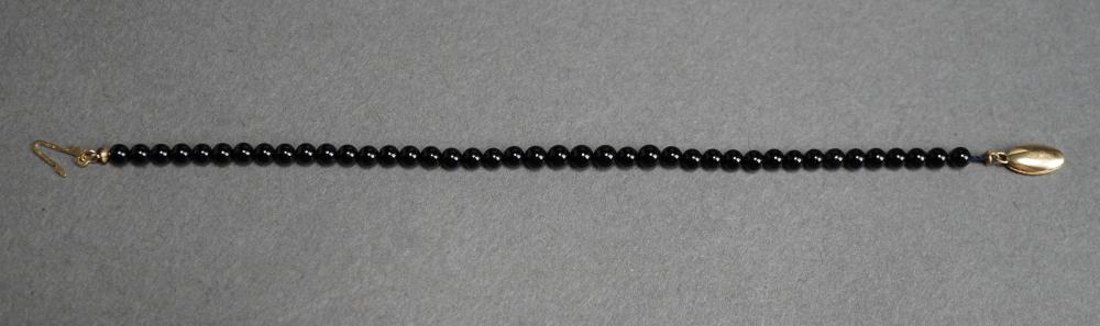 14-KARAT YELLOW-GOLD AND ONYX