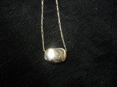 14 karat yellow gold "Bean" ne