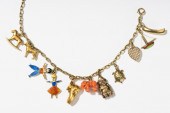 14 KARAT YELLOW GOLD CHARM BRA