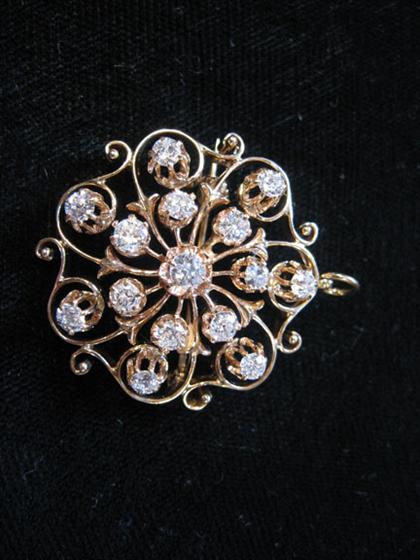 14 karat yellow gold "pinwheel"