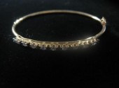 14 karat yellow gold, sapphire
