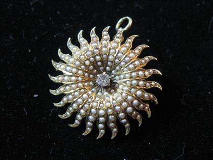 14 karat yellow gold starburst