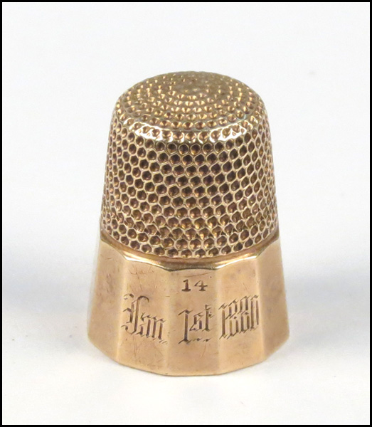 14 KARAT YELLOW GOLD THIMBLE.