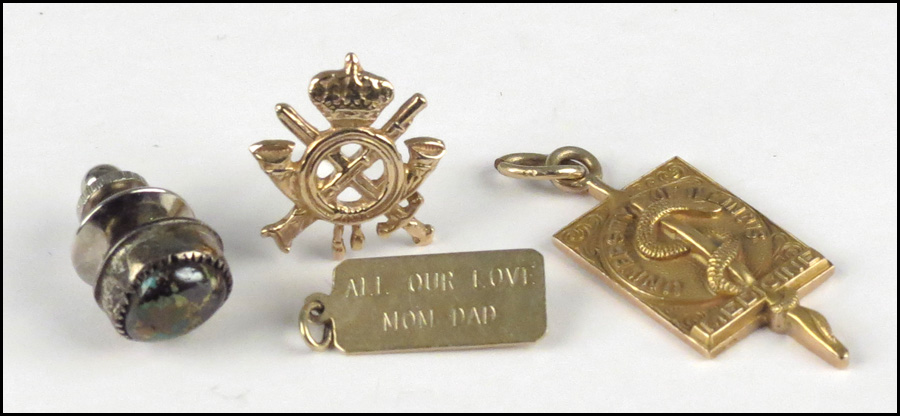 14 KARAT YELLOW GOLD TIE TACK.