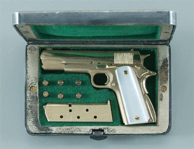 14 kt. gold miniature Colt .45