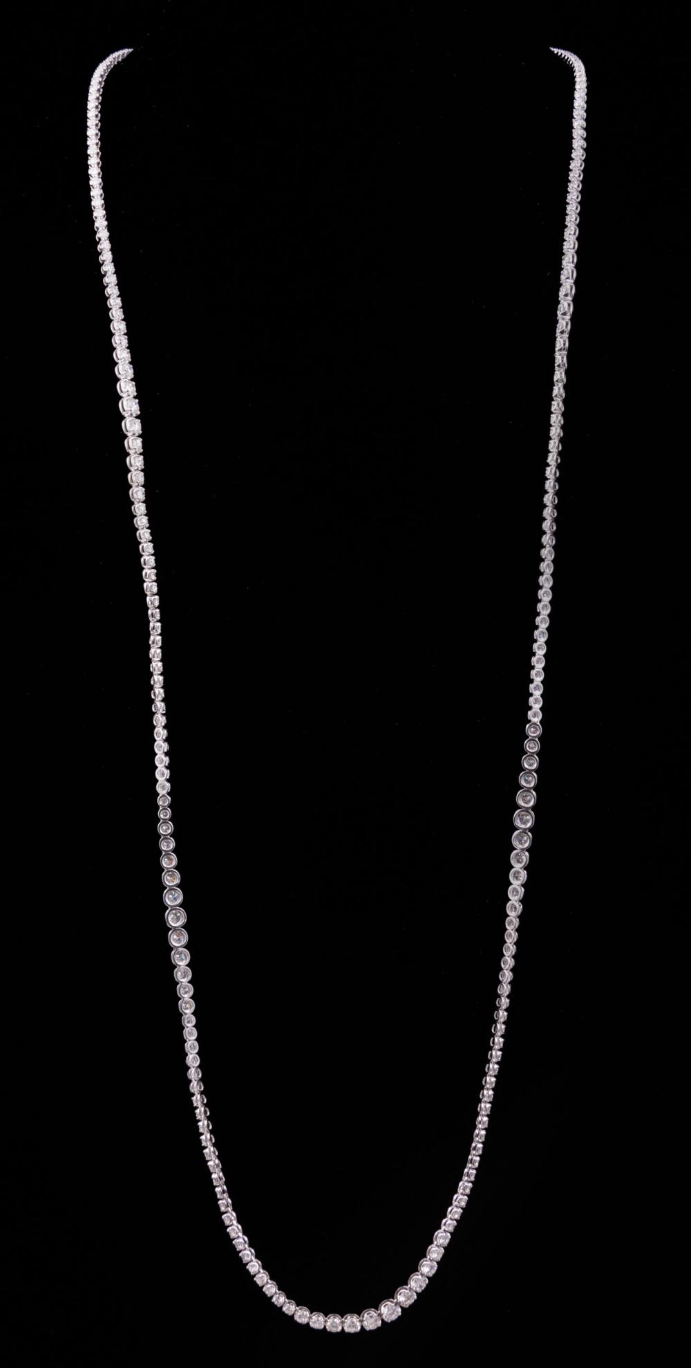 14 KT. WHITE GOLD AND DIAMOND