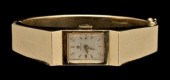 14 kt. yellow gold bangle watc