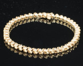14K AND DIAMOND TENNIS BRACELE