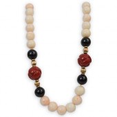 14K ANGEL SKIN CORAL AND ONYX